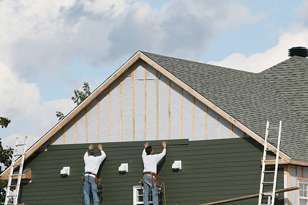 Professional Siding Installation technician working in Parkville, PA